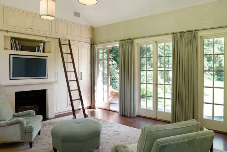 stylish french door curtains softly framing a sunlit entryway