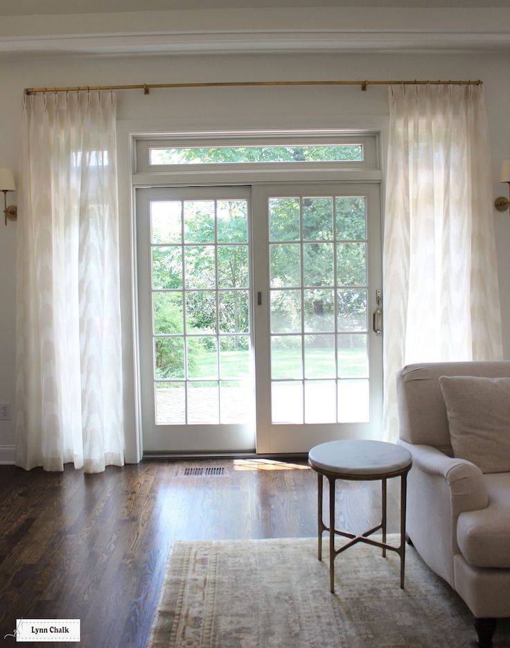 elegant sliding glass door drapes in a modern living room