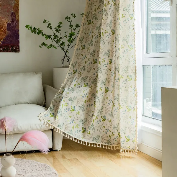 cotton curtains hanging in a cozy, sunlit living room