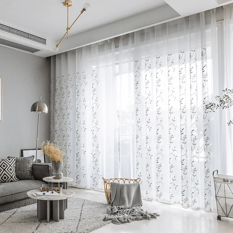 lassic window with white net curtains softly filtering natural light