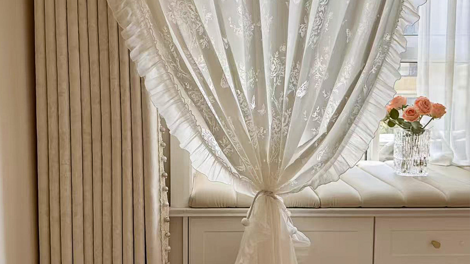 Sheer lace curtain with ruffled trim, beige blackout curtain, flowers on window bench