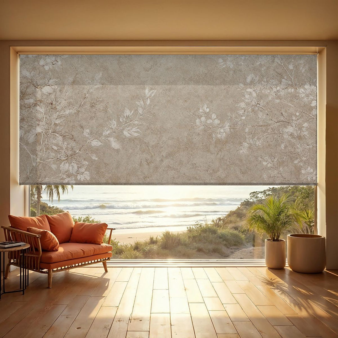 Living room with floral-patterned blackout curtain, ocean view, and rattan sofa at sunrise