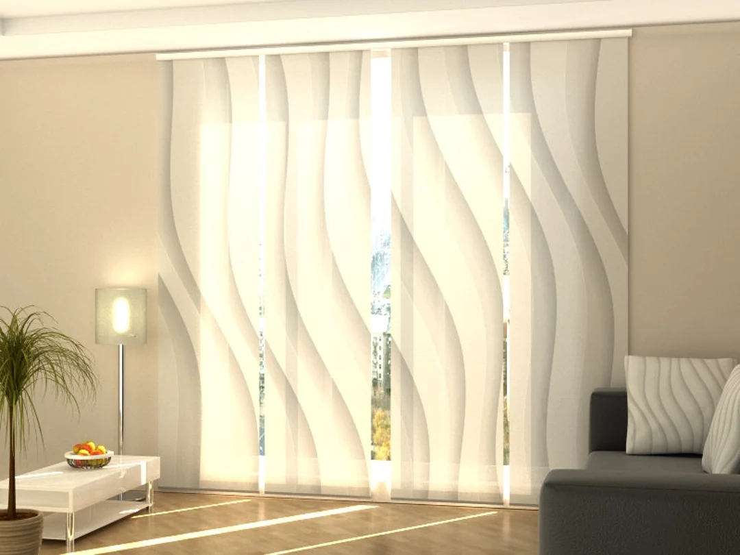 Modern living room with wavy patterned curtain panels, gray sofa, and potted plant