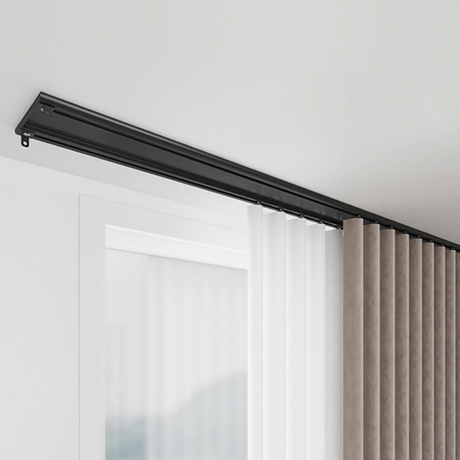 Sleek ceiling-mounted curtain track system with white sheer and beige blackout curtains