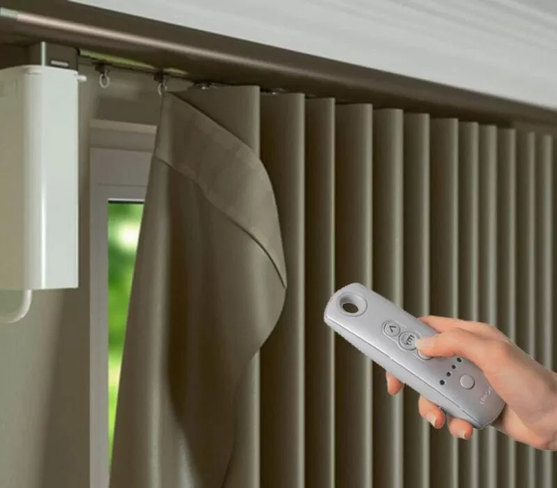 motorized drapes opening automatically in a modern smart home