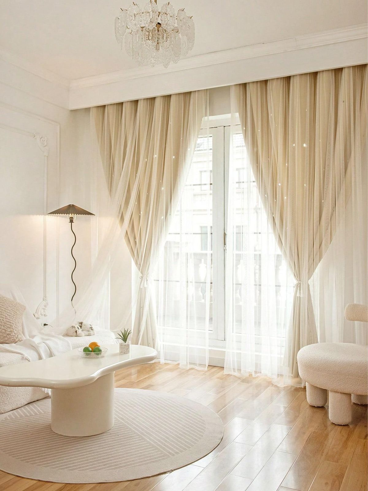 Elegant white sheer bedroom curtains with natural light