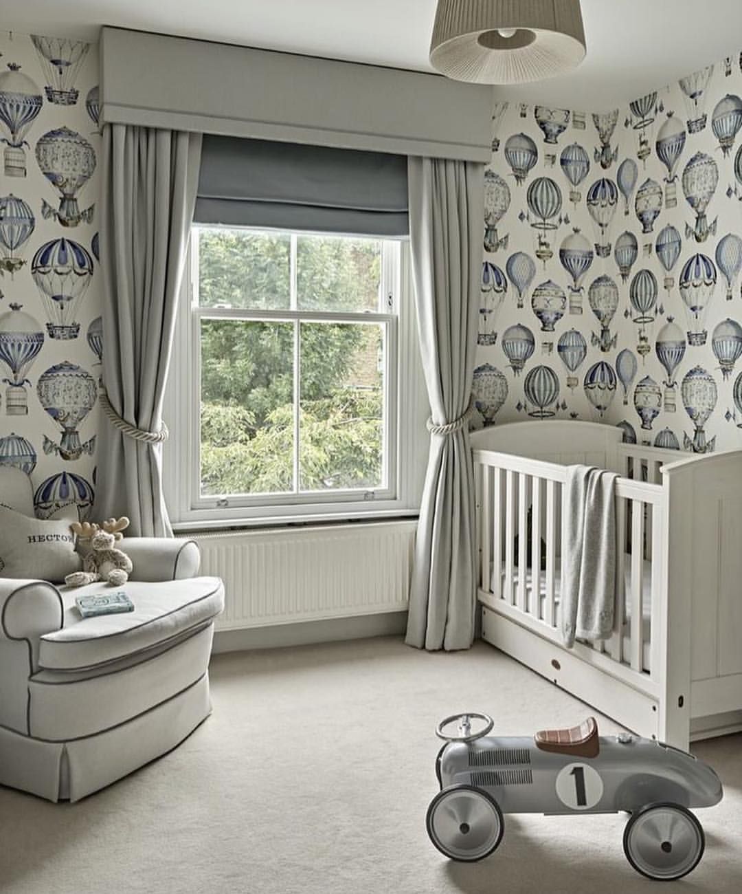 Colorful children’s room with playful and safe curtains framing the window