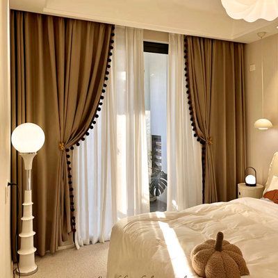 Soft and stylish light filtering curtains gently illuminating a cozy room with natural sunlight