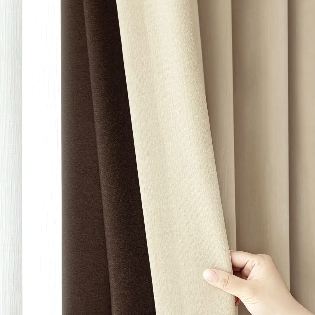 Close-up of beige blackout thermal curtain fabric with soft, textured surface.