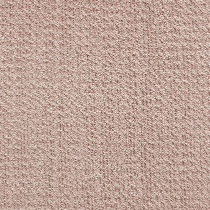 Close-up of textured beige blackout curtain fabric sample