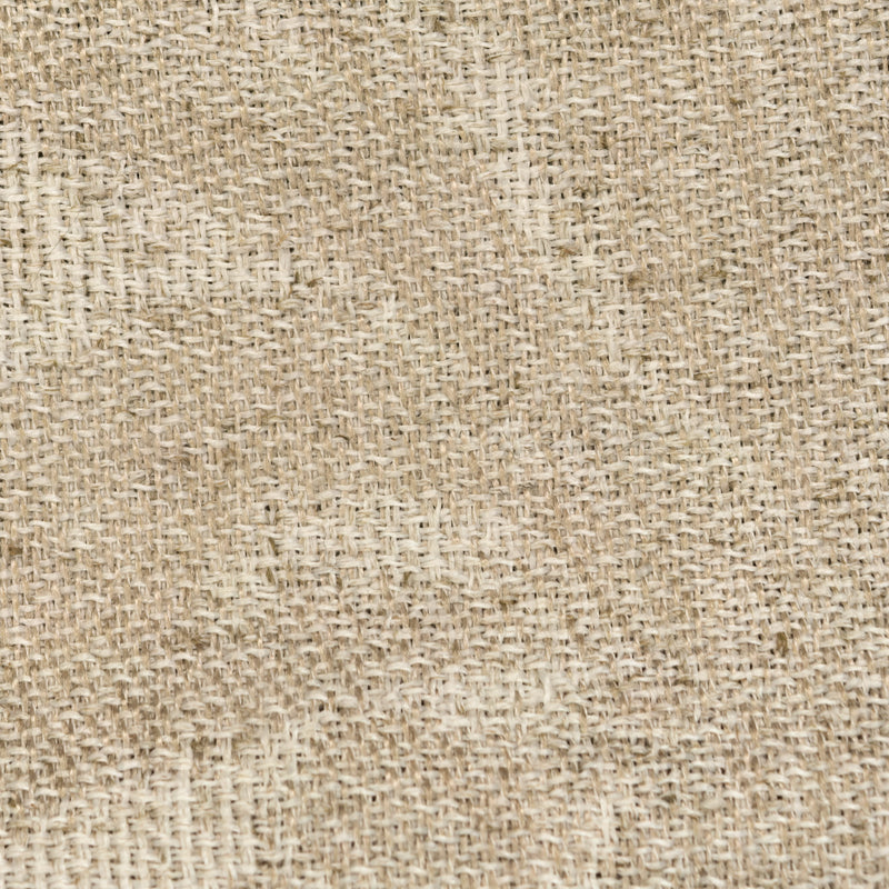 Close-up of beige linen curtain fabric with textured weave pattern