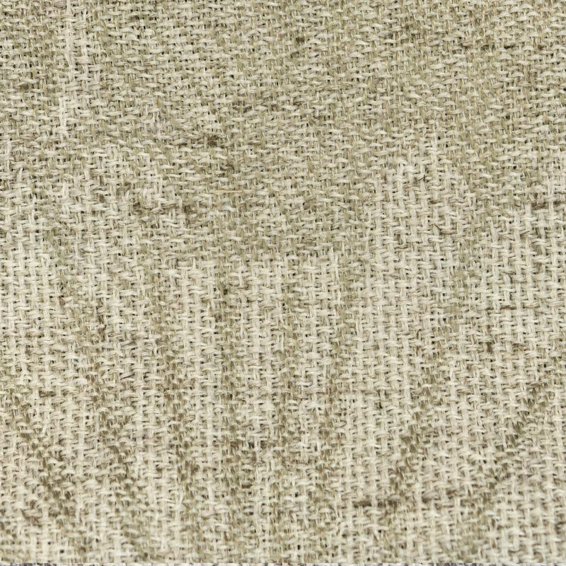 Close-up of textured beige curtain fabric with natural woven pattern