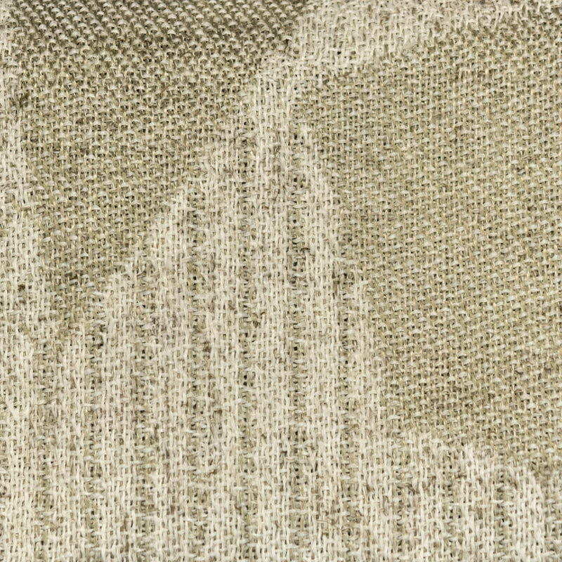 Close-up of beige woven curtain fabric texture with subtle pattern detail