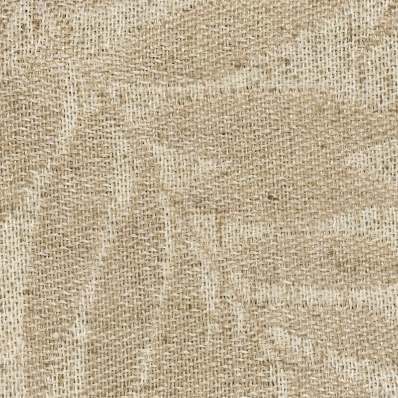 Close-up of beige woven curtain fabric with textured natural fiber pattern