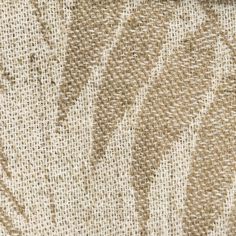 Close-up of beige and white woven curtain fabric texture