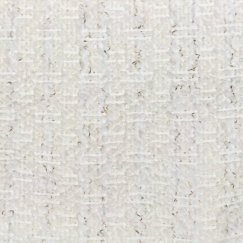 Close-up of textured off-white curtain fabric with woven pattern