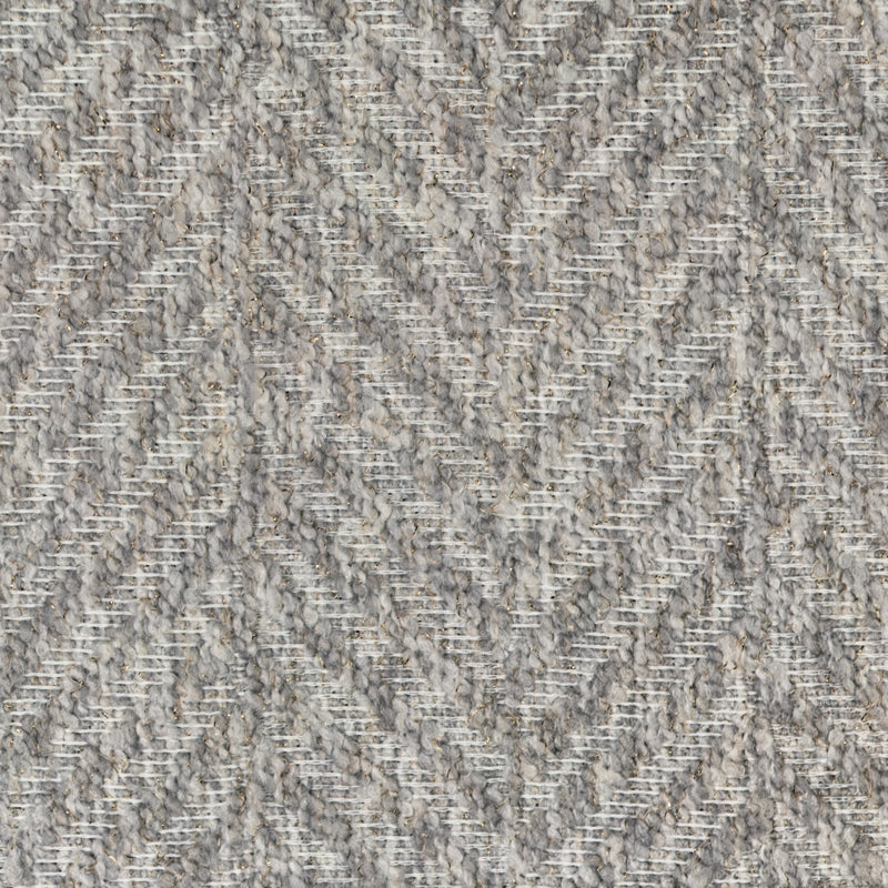 Close-up of grey and beige herringbone textured blackout curtain fabric sample