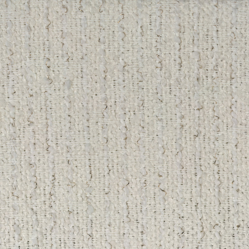 Close-up of textured cream curtain fabric sample with woven boucle pattern