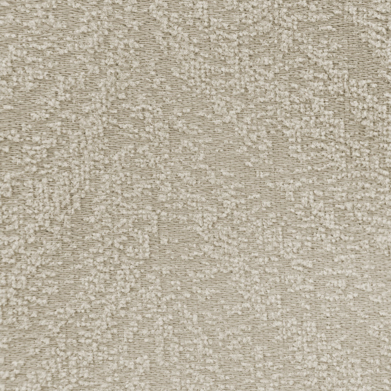 Close-up of textured beige blackout curtain fabric with a subtle woven pattern