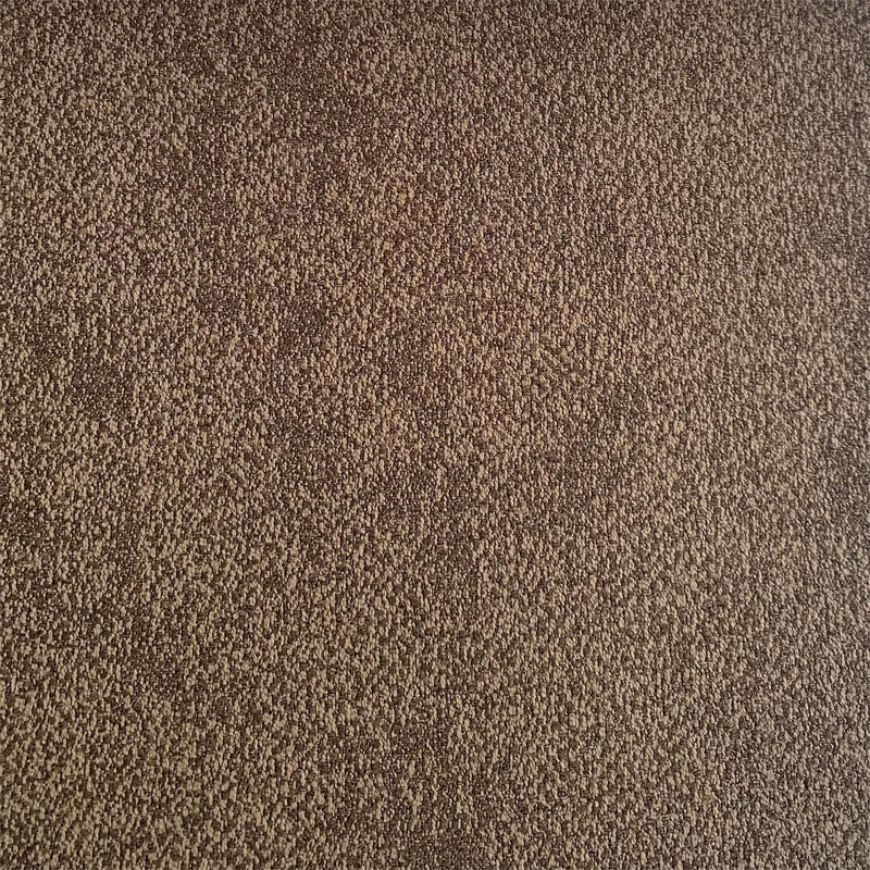 Close-up of textured brown blackout curtain fabric with thermal insulation