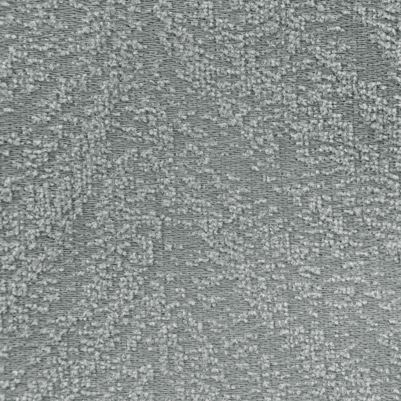 Close-up of textured gray blackout curtain fabric with subtle woven pattern