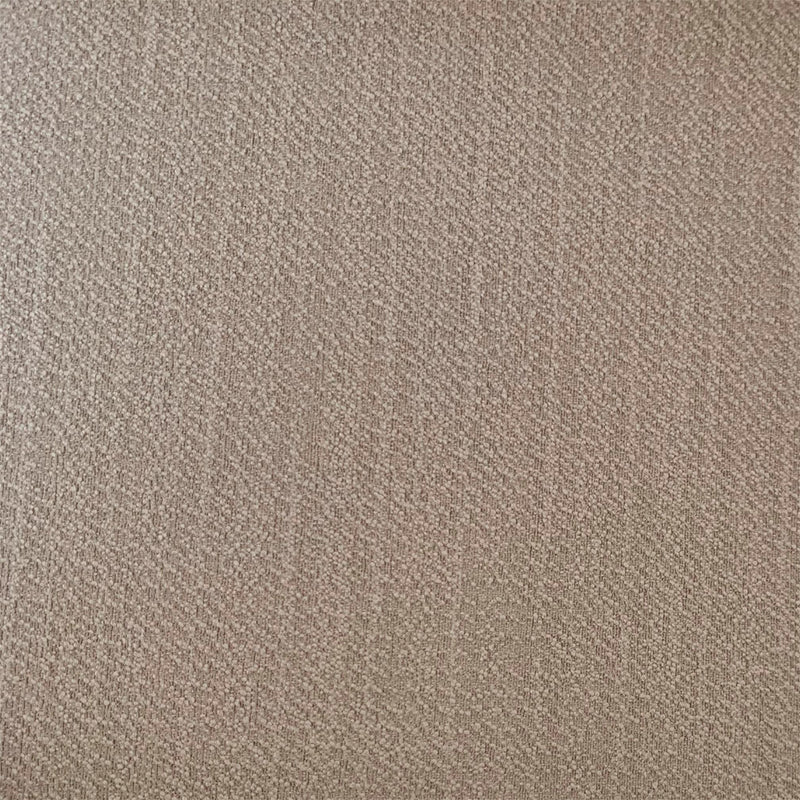 Close-up of beige blackout curtain fabric with textured weave pattern.