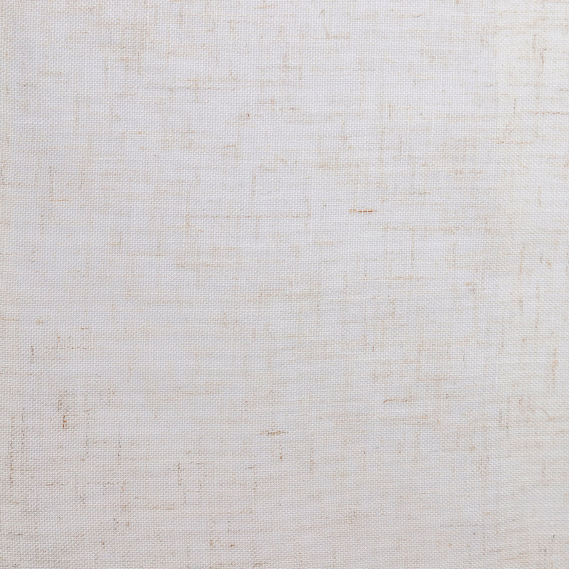 Close-up of textured light beige blackout curtain fabric, ideal for window treatment.