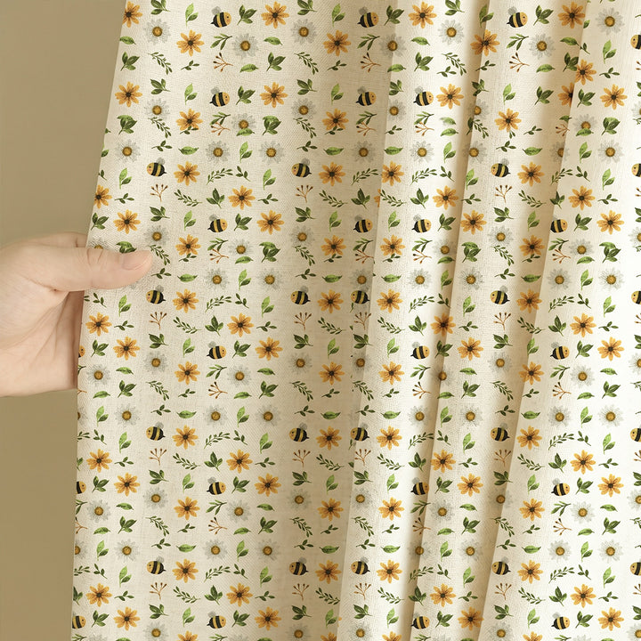 Hand holding custom kids blackout curtains with vintage floral sunflower and botanical leaf pattern