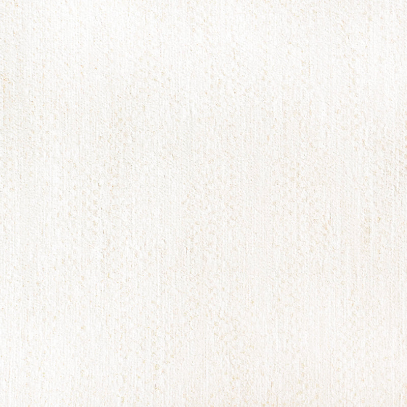 Close-up of cream textured blackout curtain fabric sample