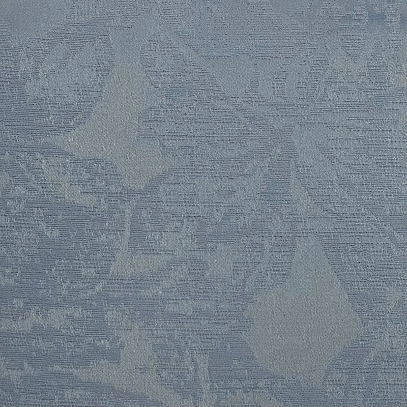Textured blue thermal blackout curtain fabric with subtle leaf pattern