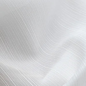White sheer curtain fabric with textured vertical stripes, ideal for modern window treatments