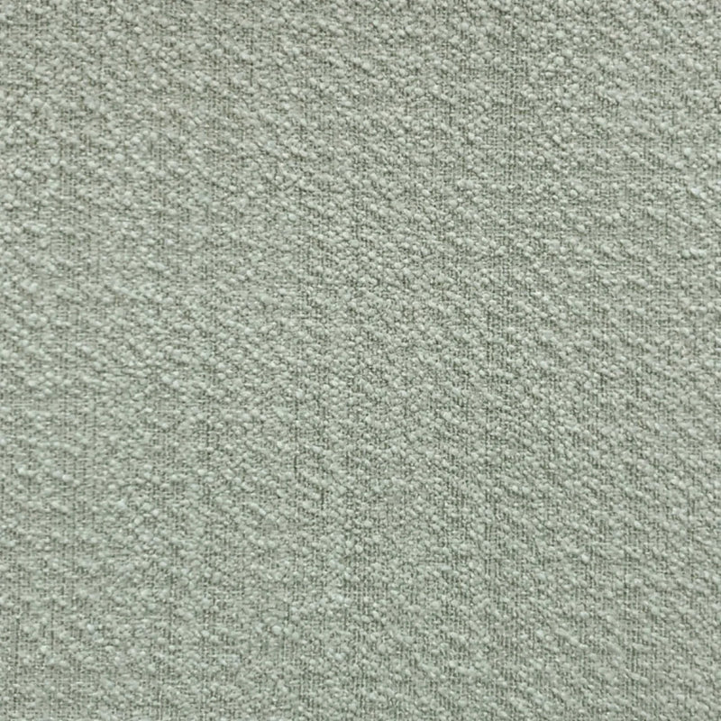 Light grey textured blackout curtain fabric close-up, showing woven thermal material detail.