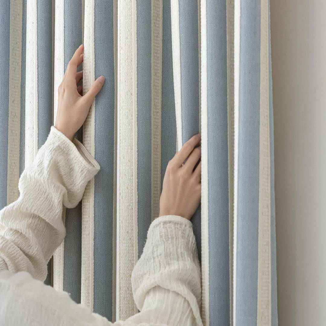 hugmoom custom striped hygge curtains, close‑up of blue neutral woven stripe fabric texture for luxury estate nursery room, high‑end custom window drapes