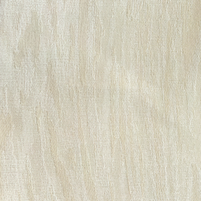 Opalescent sheer grey curtain fabric with subtle textured pattern, ideal for light filtering.