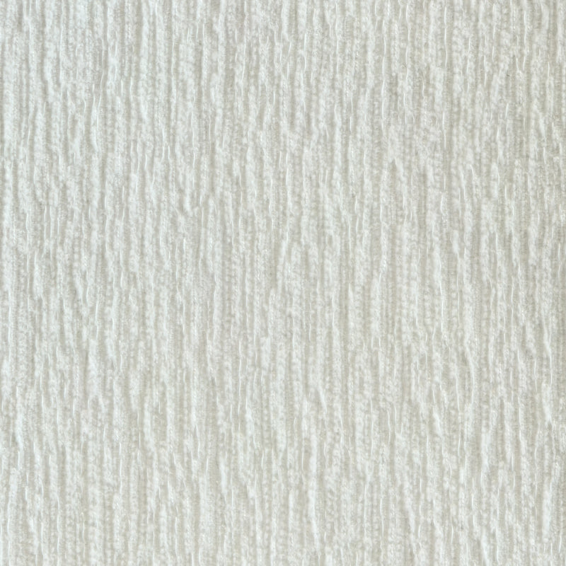 Textured opalescent sheer white curtain fabric, close-up for window treatments