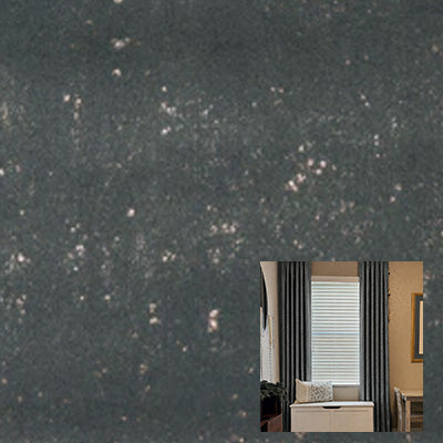 Gray velvet curtain fabric with subtle sheen and a modern living room window display.