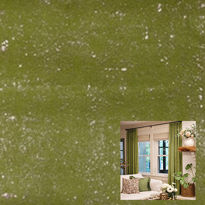 Green velvet curtain fabric with a subtle texture, showcased in a living room window setup